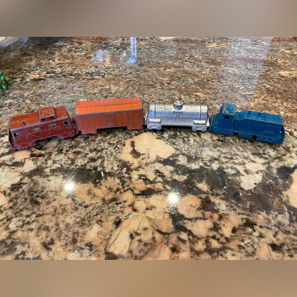 Vintage Midgetoy Metal Train, four pieces